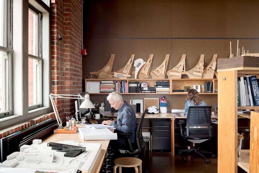 Olson Kundig designs own office interior with cityscape timber table