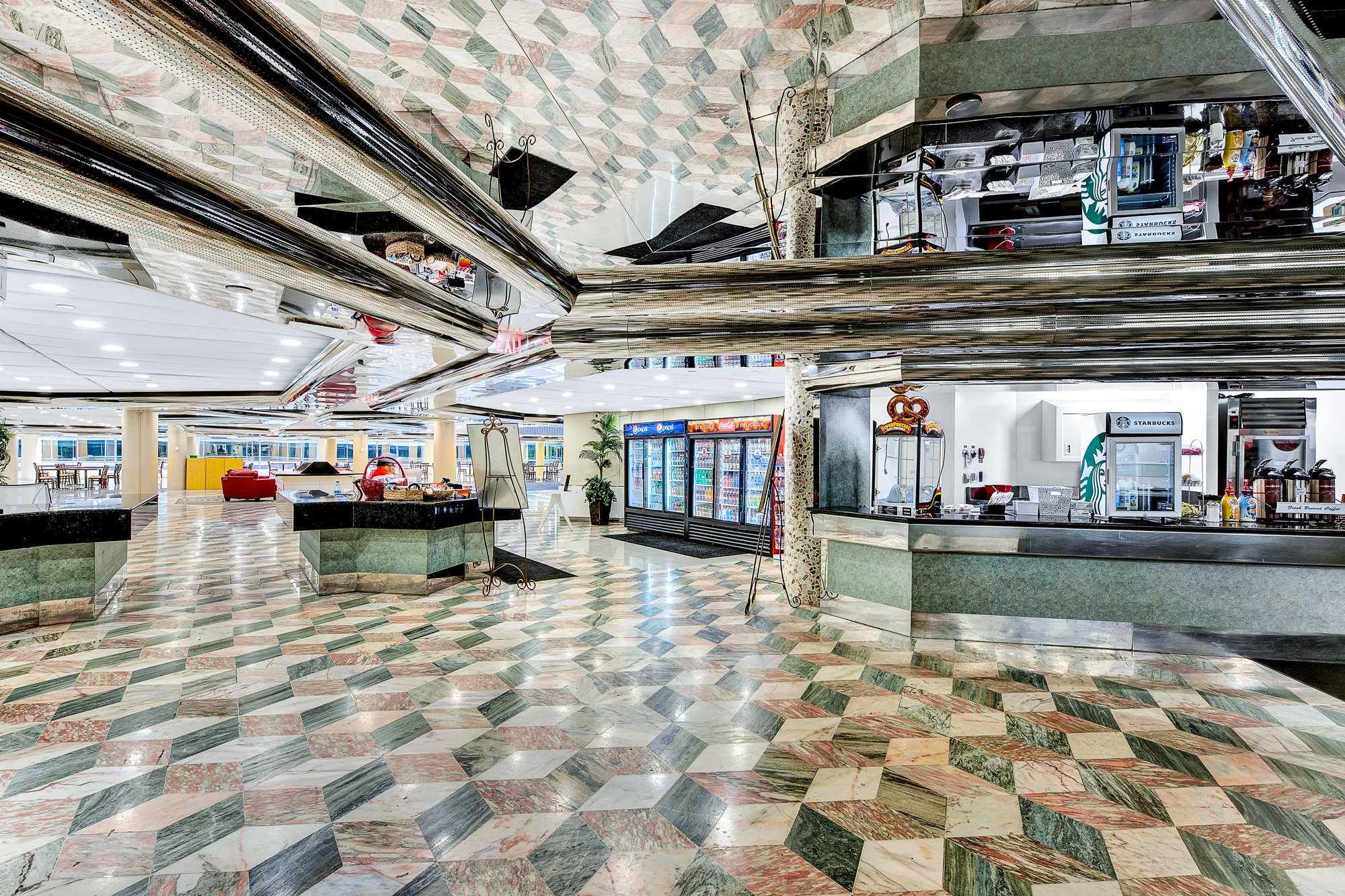 A cafeteria with chrome ceilings at the union carbide building