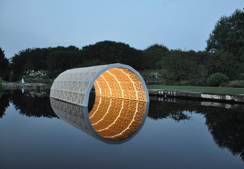 3D printed ceramics installation on a reflection pool in a botanical garden