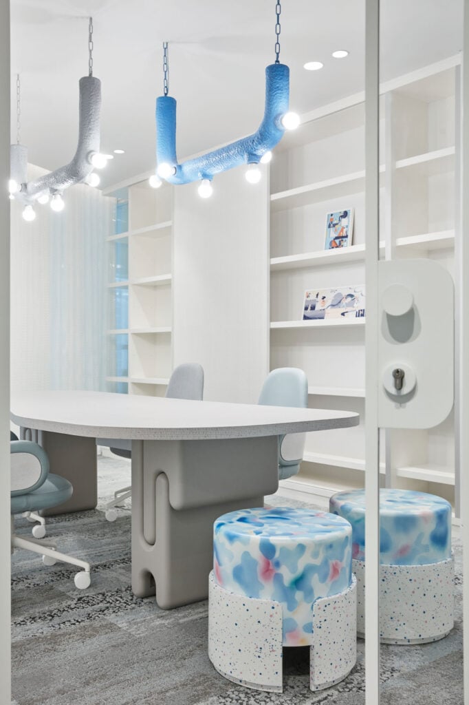 sculptural light fixture in a conference room.