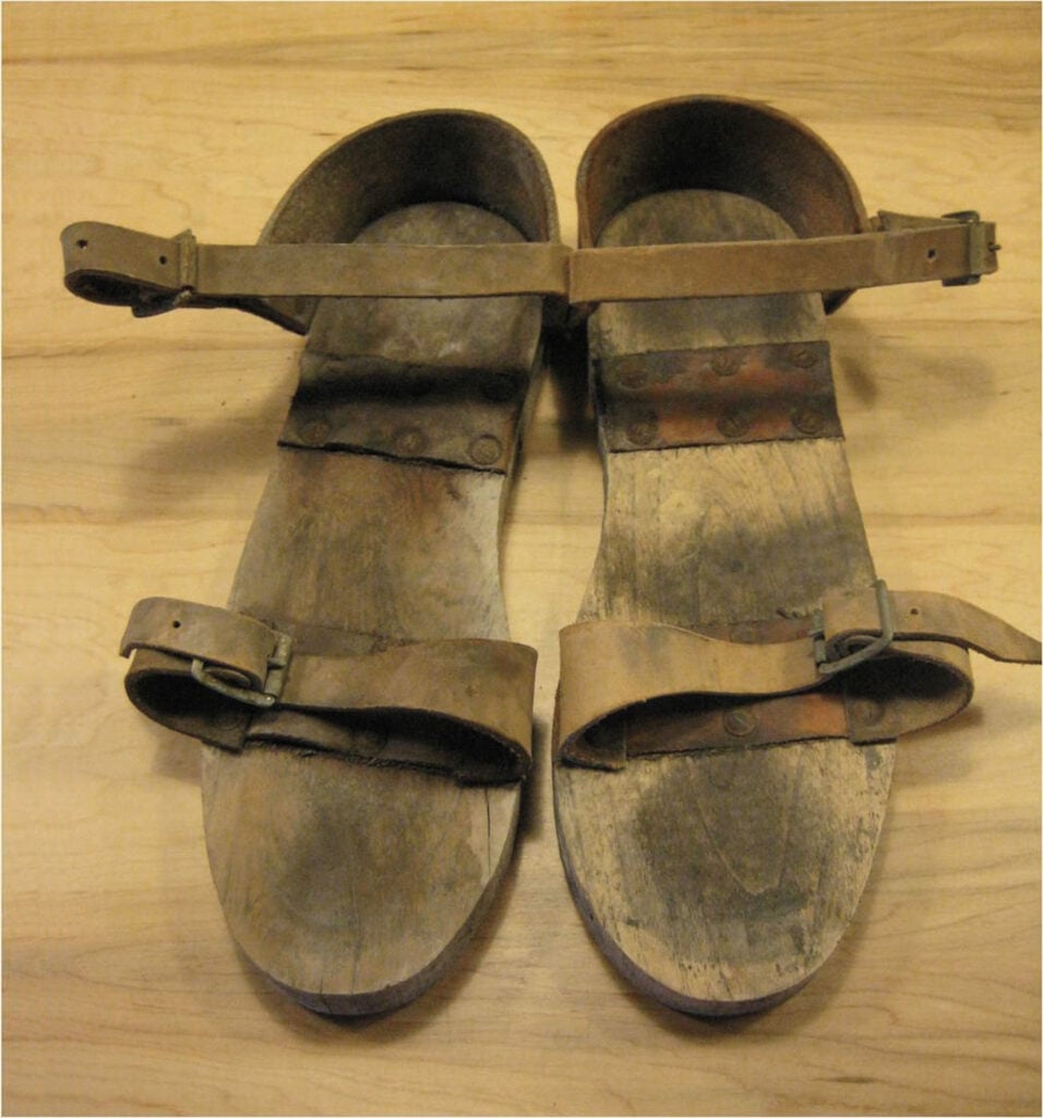 pair of wooden and leather work clogs