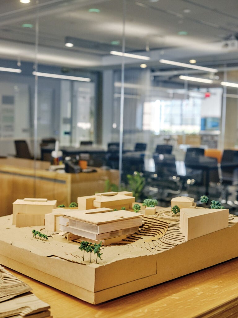 image of orange chairs inside a multi use workspace