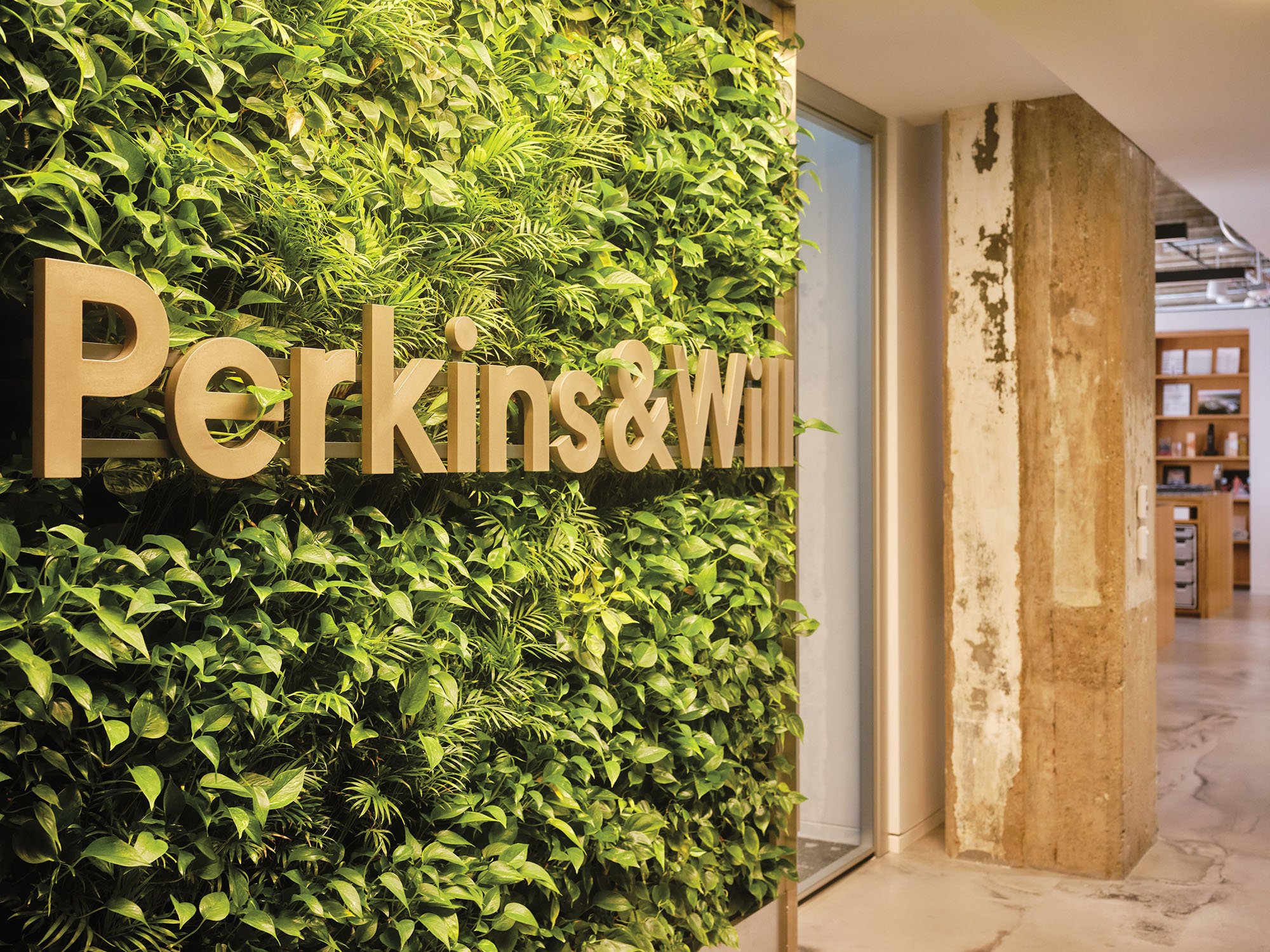 living wall with firm's logo