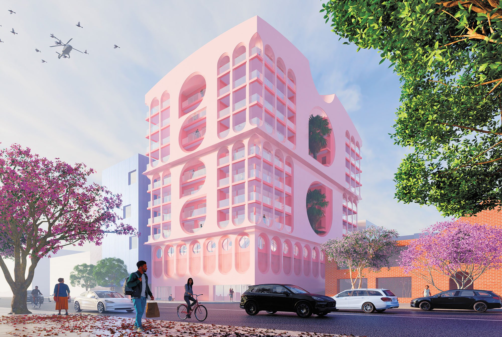 image of a pink apartment building