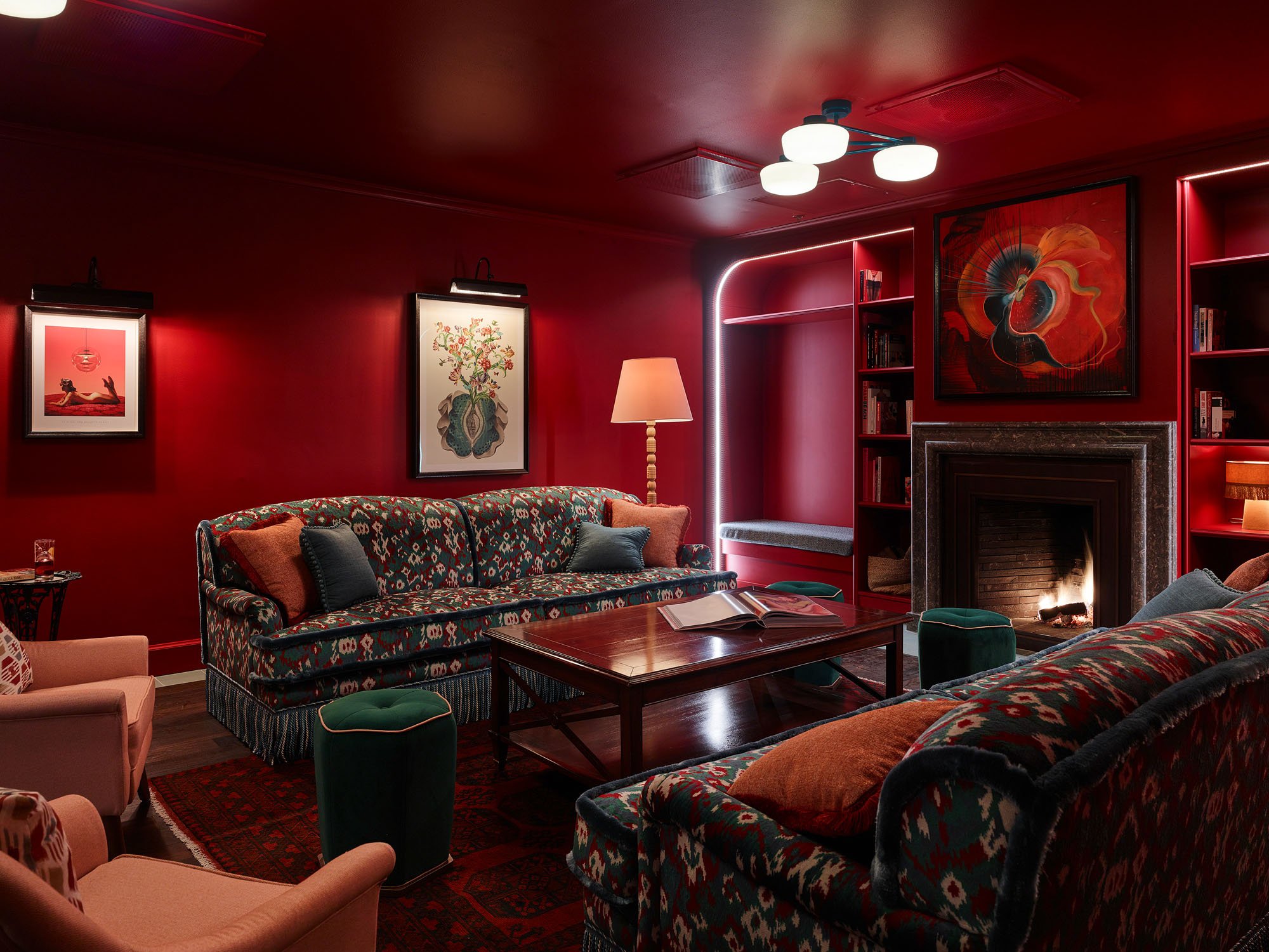 hotel library in shades of deep red and brown