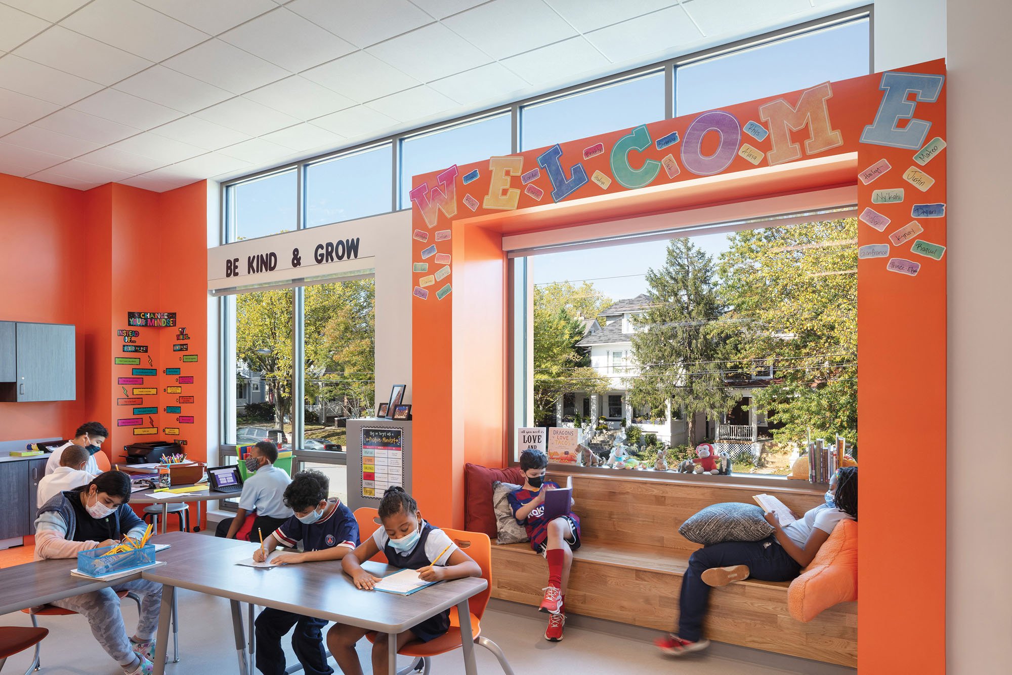 interior of a classroom with orange walls