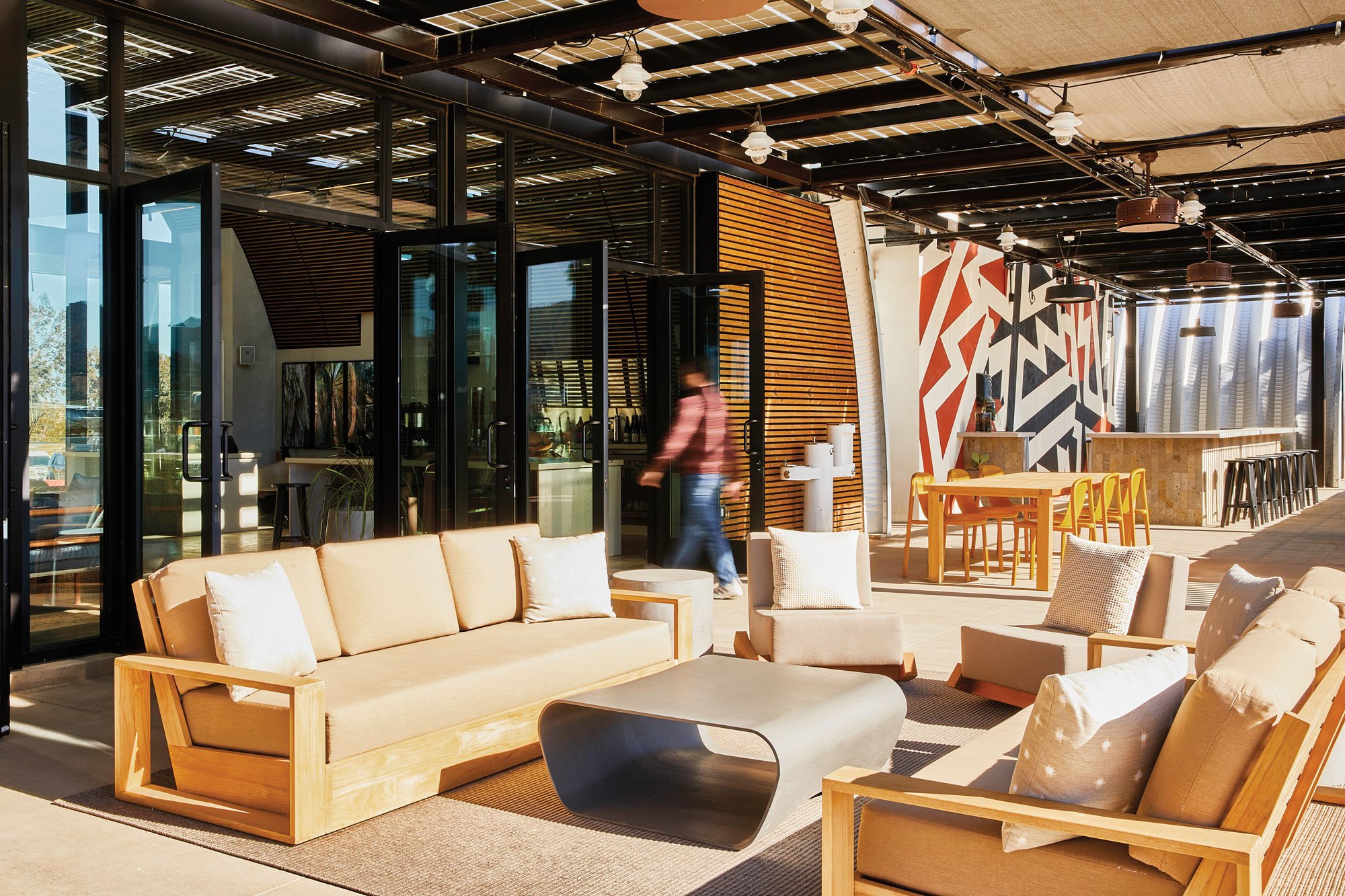 Chairs and couches outside on a porch