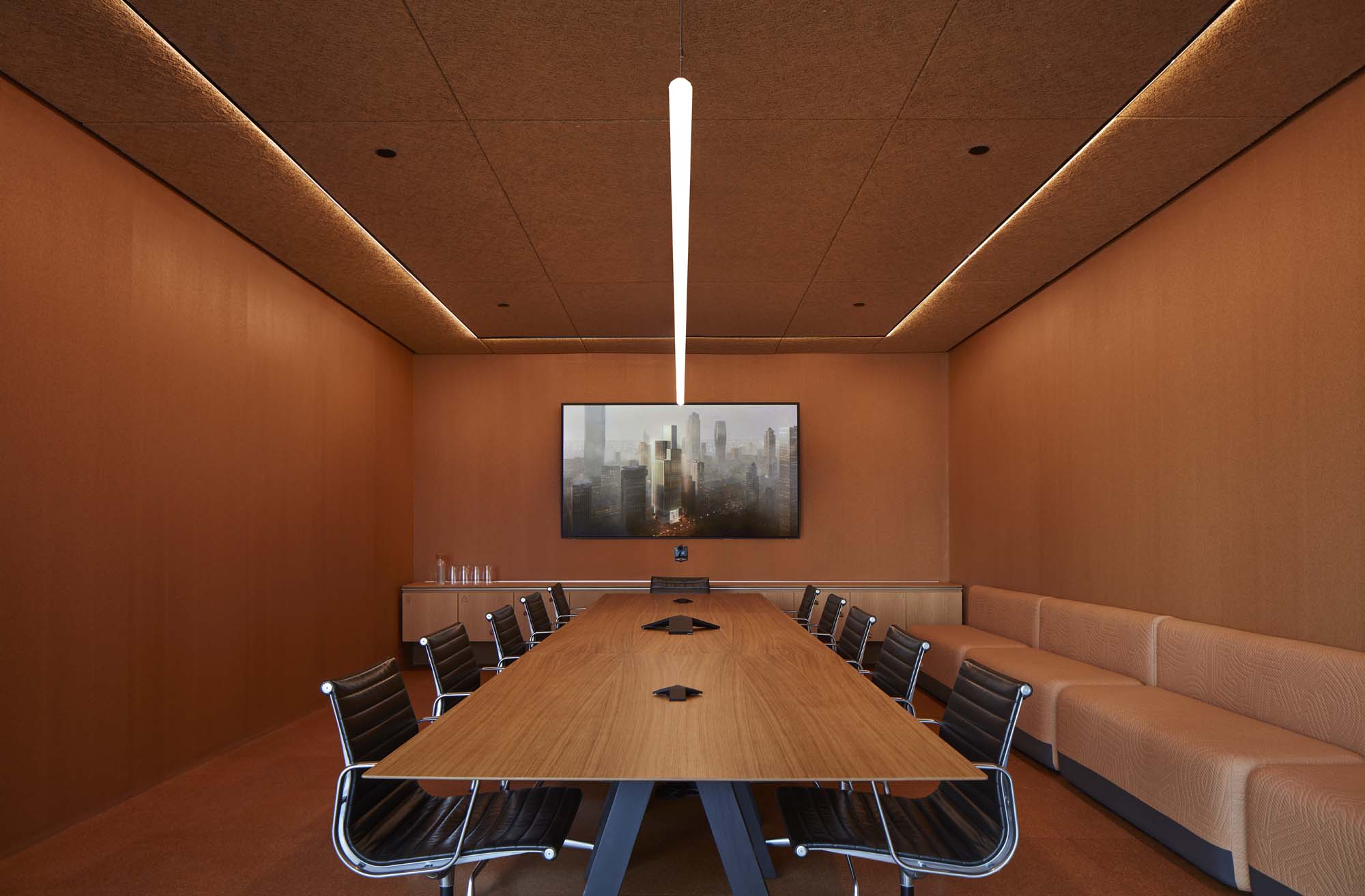 Conference room lined with cork. 