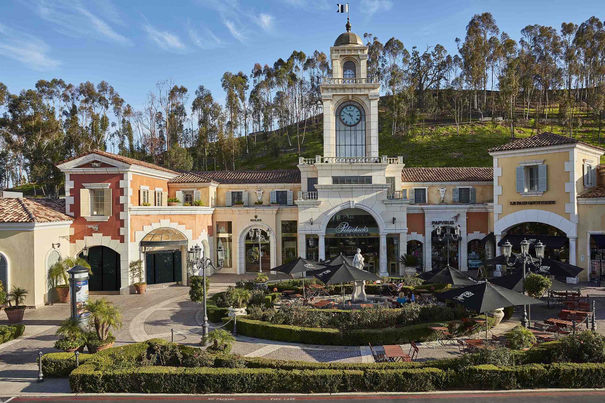 A clock tower and italianate garden at the commons at Calabasas