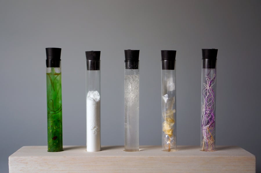 test tubes holding material samples for sustainable yarn production