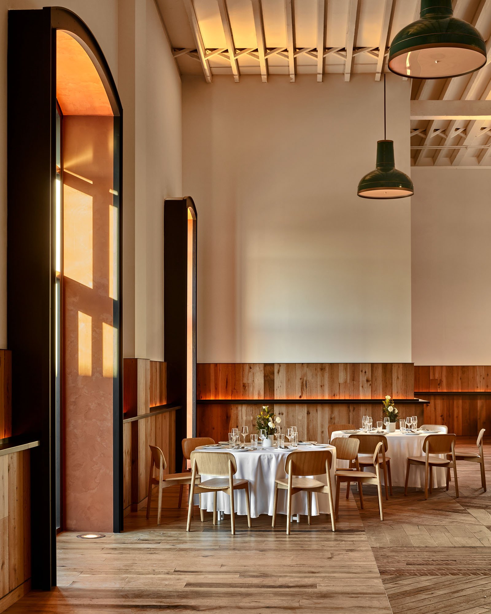 a detail photograph of tables and chairs in the city harvest demonstration kitchen designed by Rockwell group