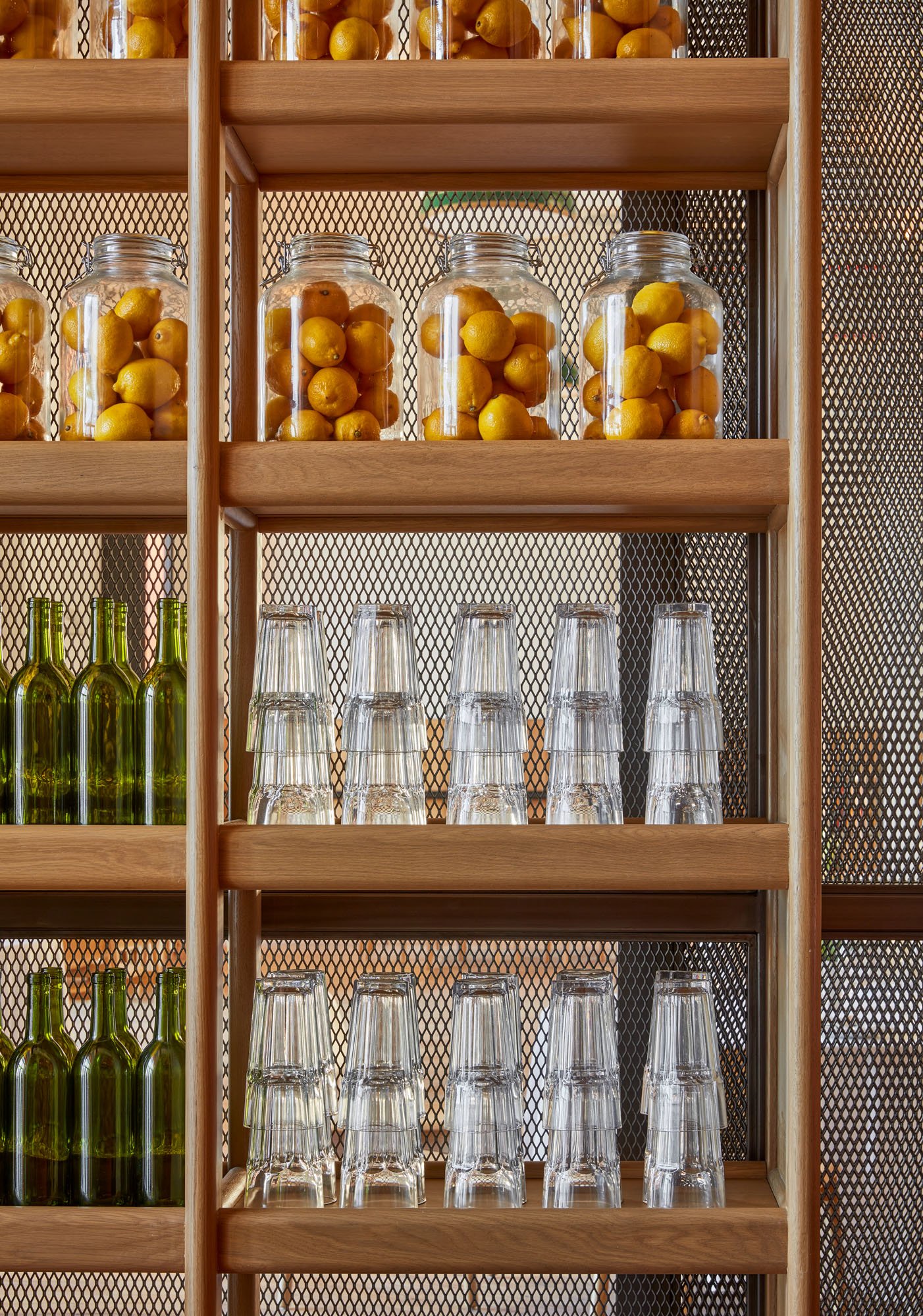 a detail photograph of shelves in the city harvest demonstration kitchen designed by Rockwell group