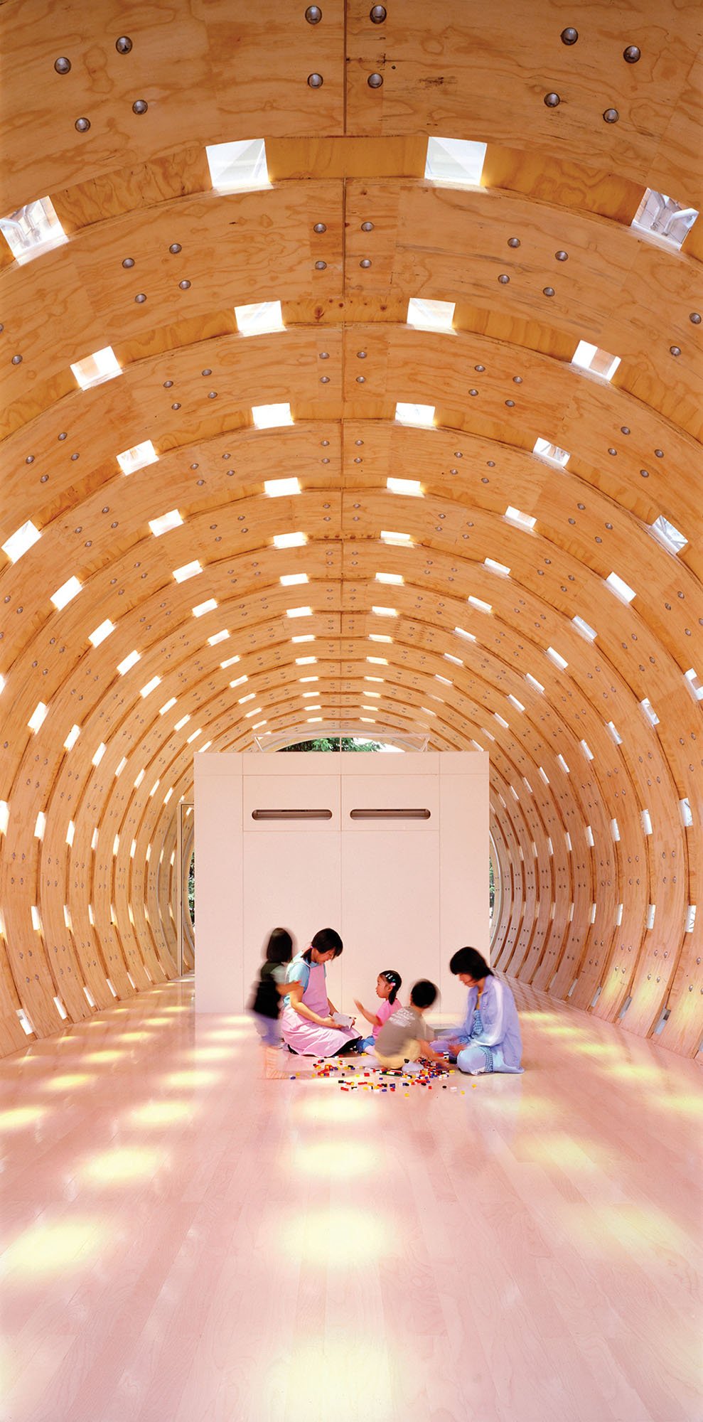 the interior of a building where children are playing