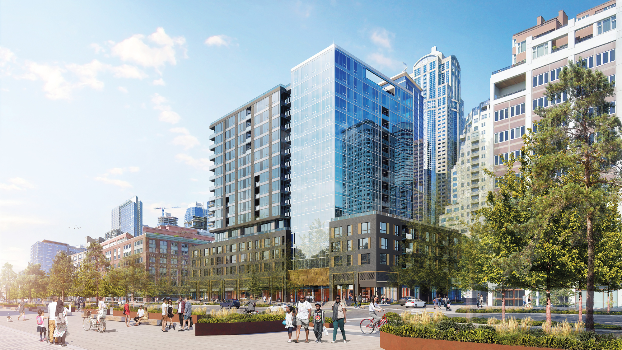 large glass buildings in front of a busy street