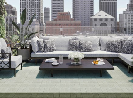 Outdoor living space with lounging sofas on a sunny day