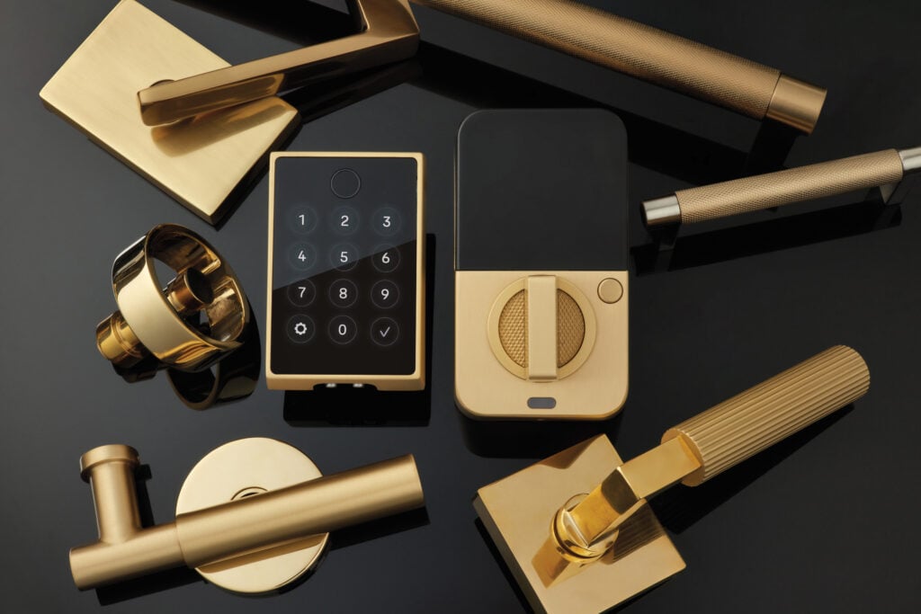 Handles and door knobs with keypad and touch detailing made in gold finish.