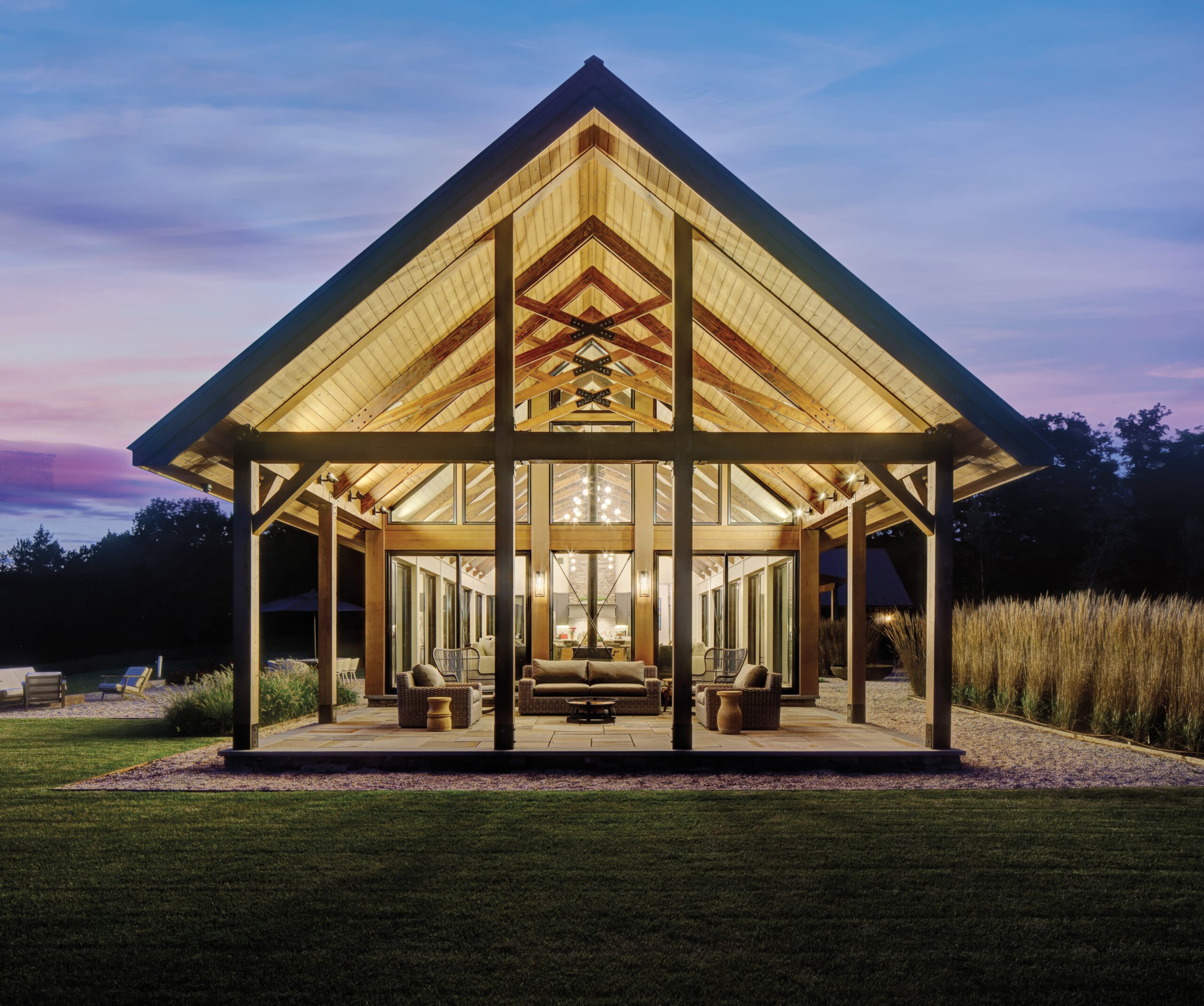 An a frame made in wood and glass to show all the interiors of the house
