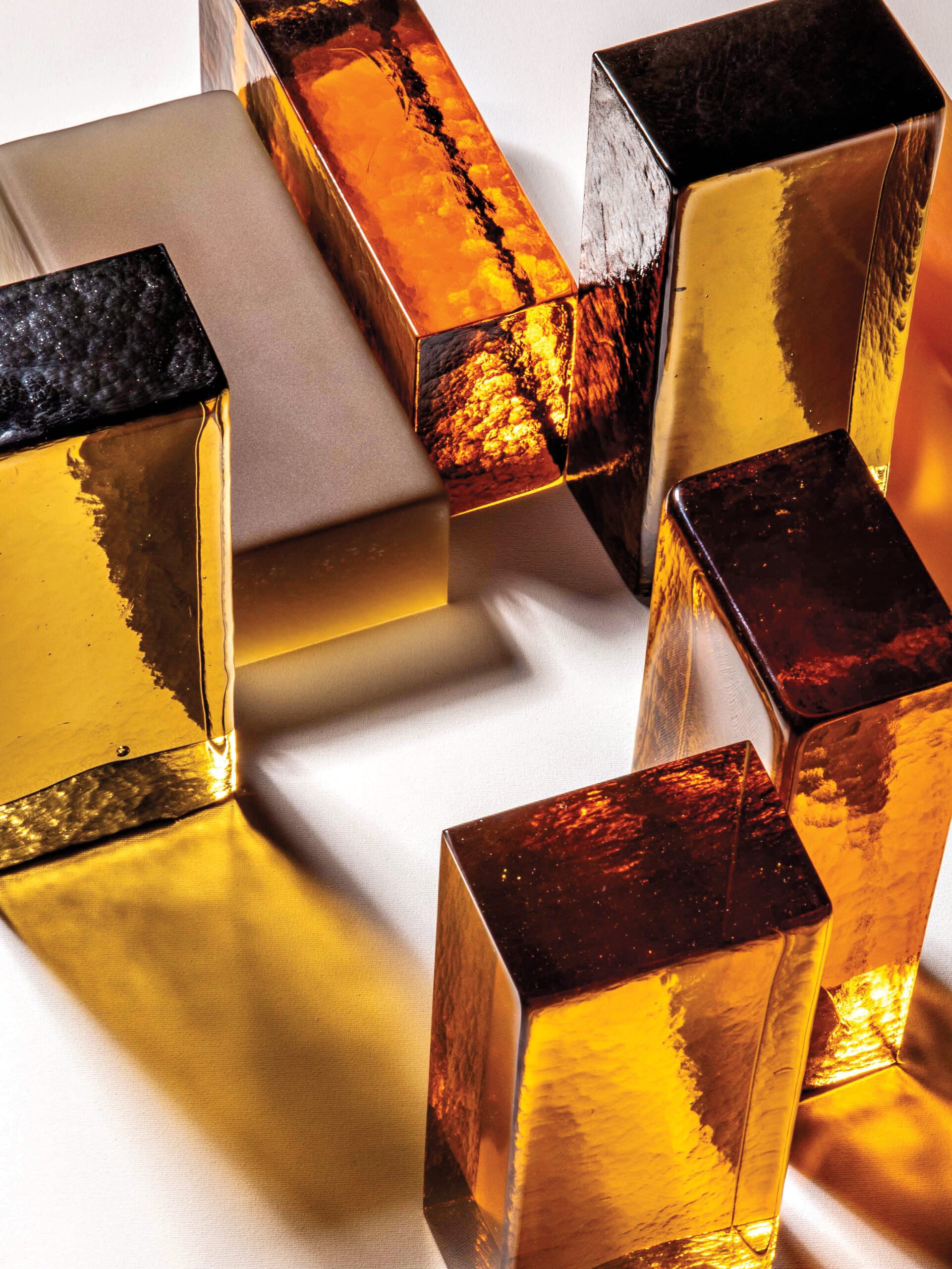 Blocks of translucent yellow and brown glass. 