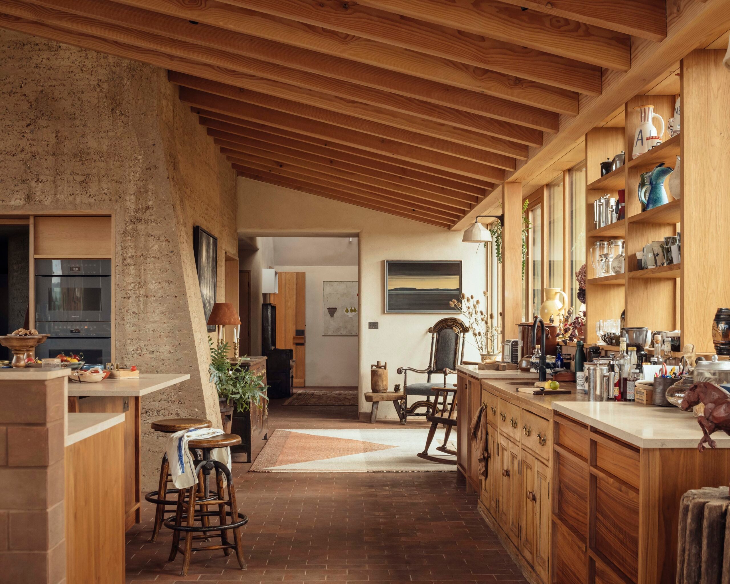 interior kitchen of a modern house made of rammed earth