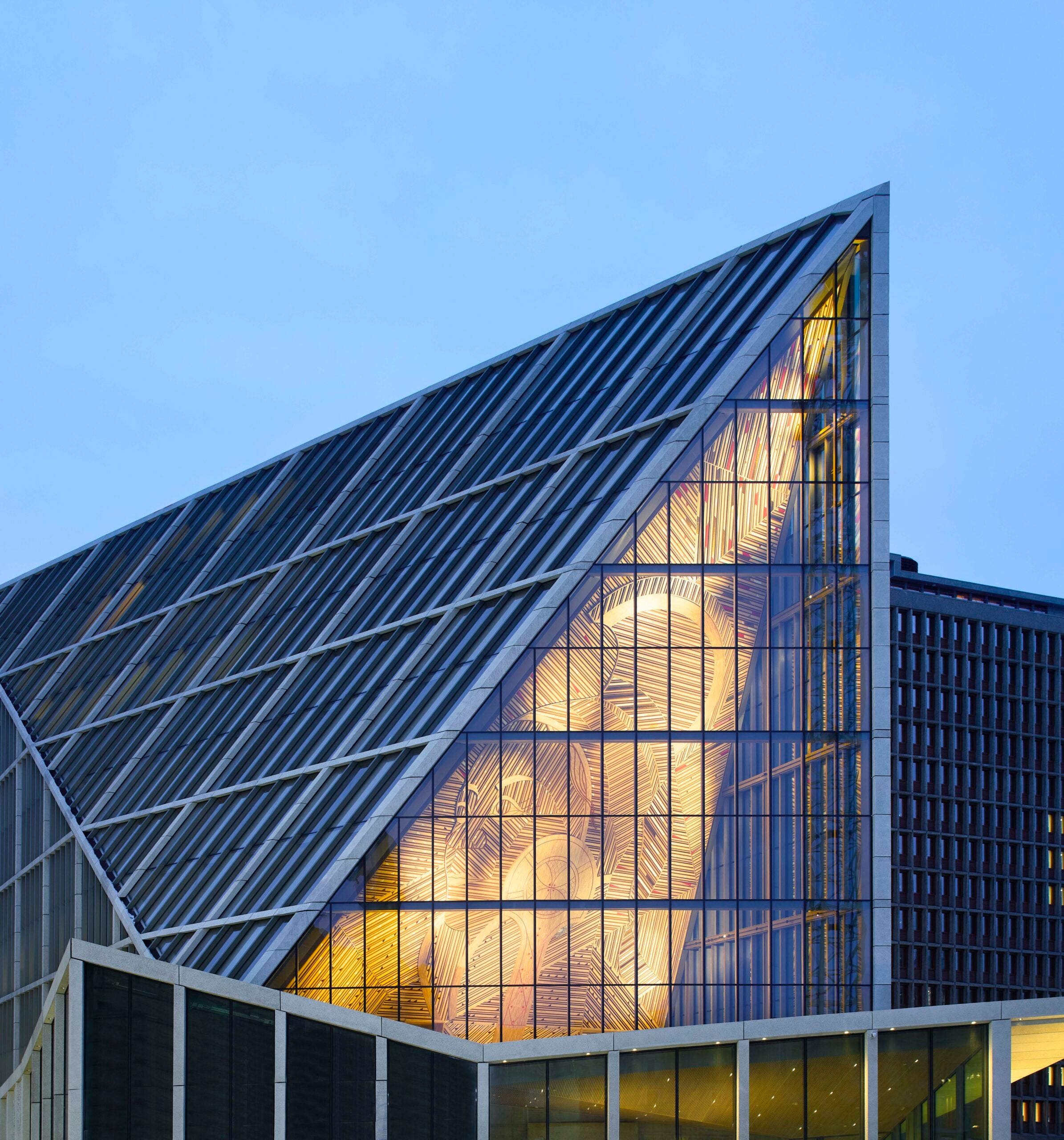 building of an exterior building in norway with the interior wood design shining through