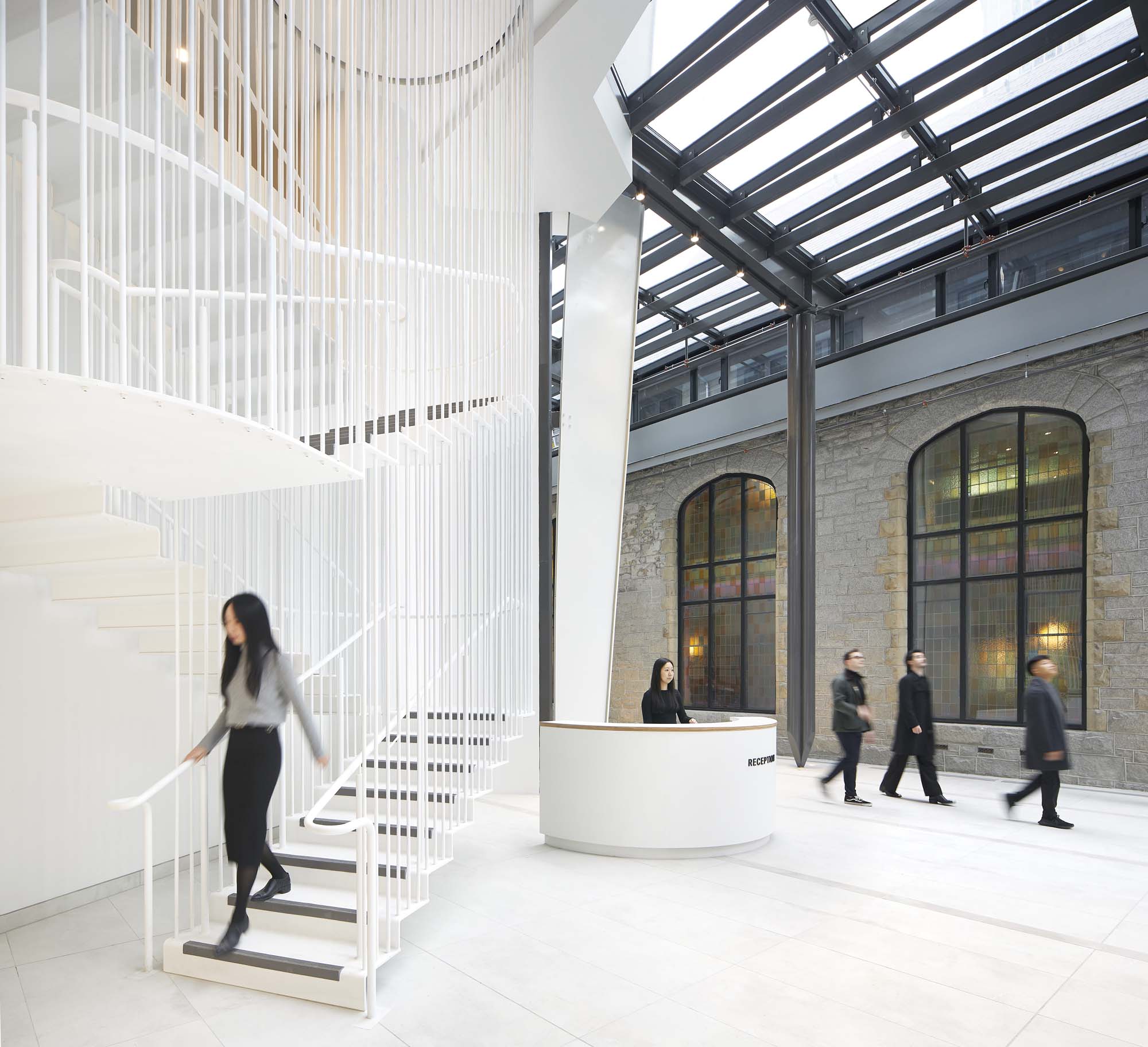 Tower interior space with white flooring and staircase