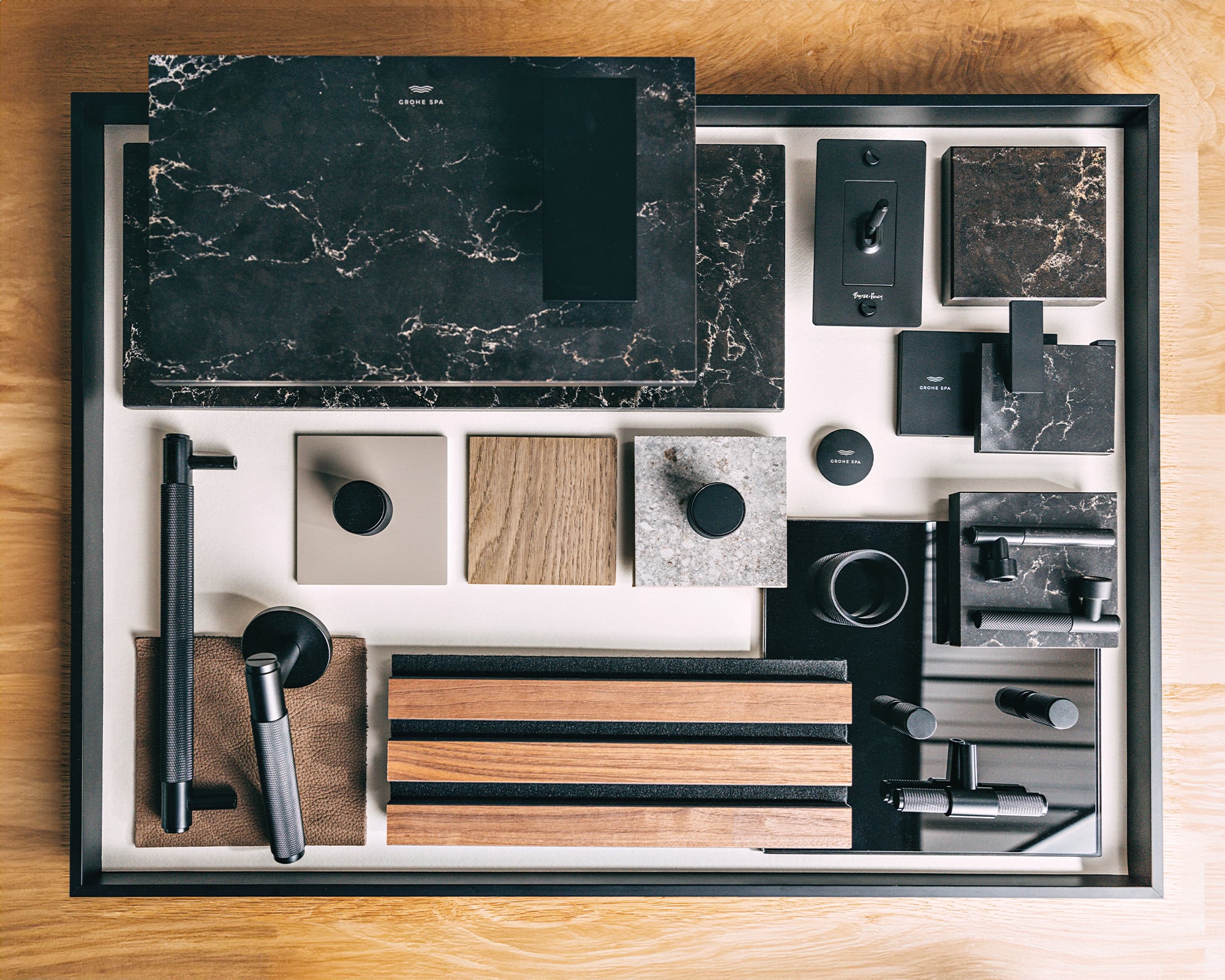 GROHE SPA x BUSTER + PUNCH collection: solid metal hardware, lighting fixtures and wood samples from birds-eye view