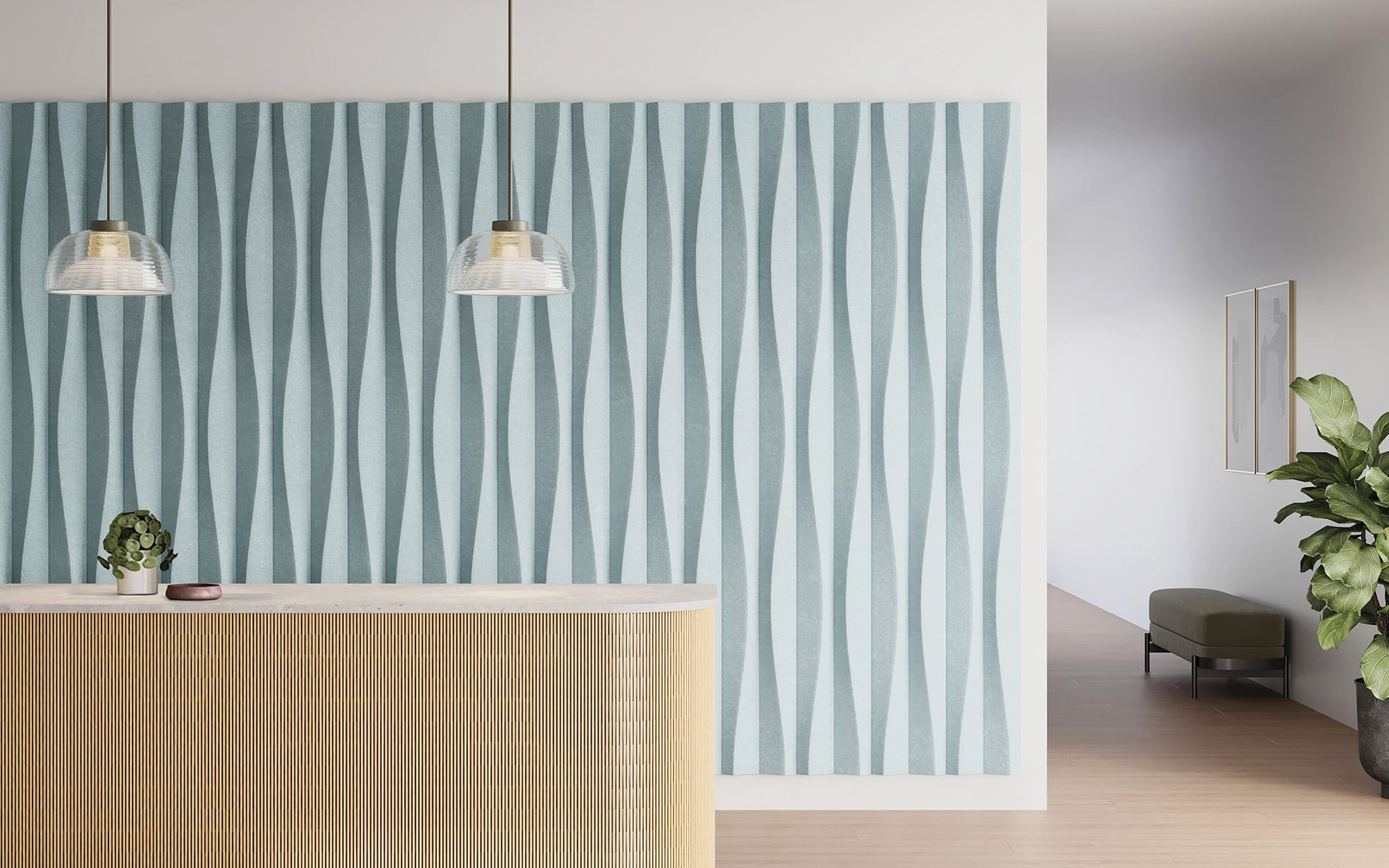 Modern interior with a front desk, geometric blue patterned wall panels, two pendant lights, a plant, and minimalist decor.