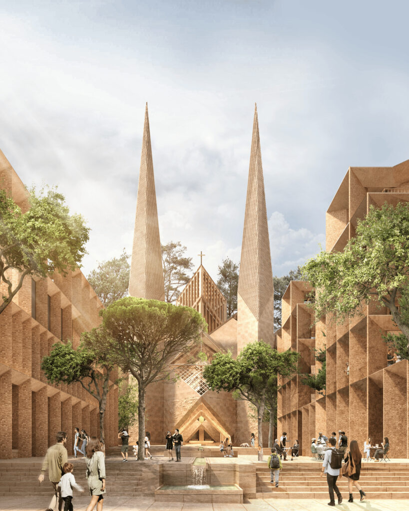 People gather in a plaza with trees, a central fountain, and a modern brick church with two tall spires designed in the distinctive style of Níall McLaughlin, all beneath a partly cloudy sky.