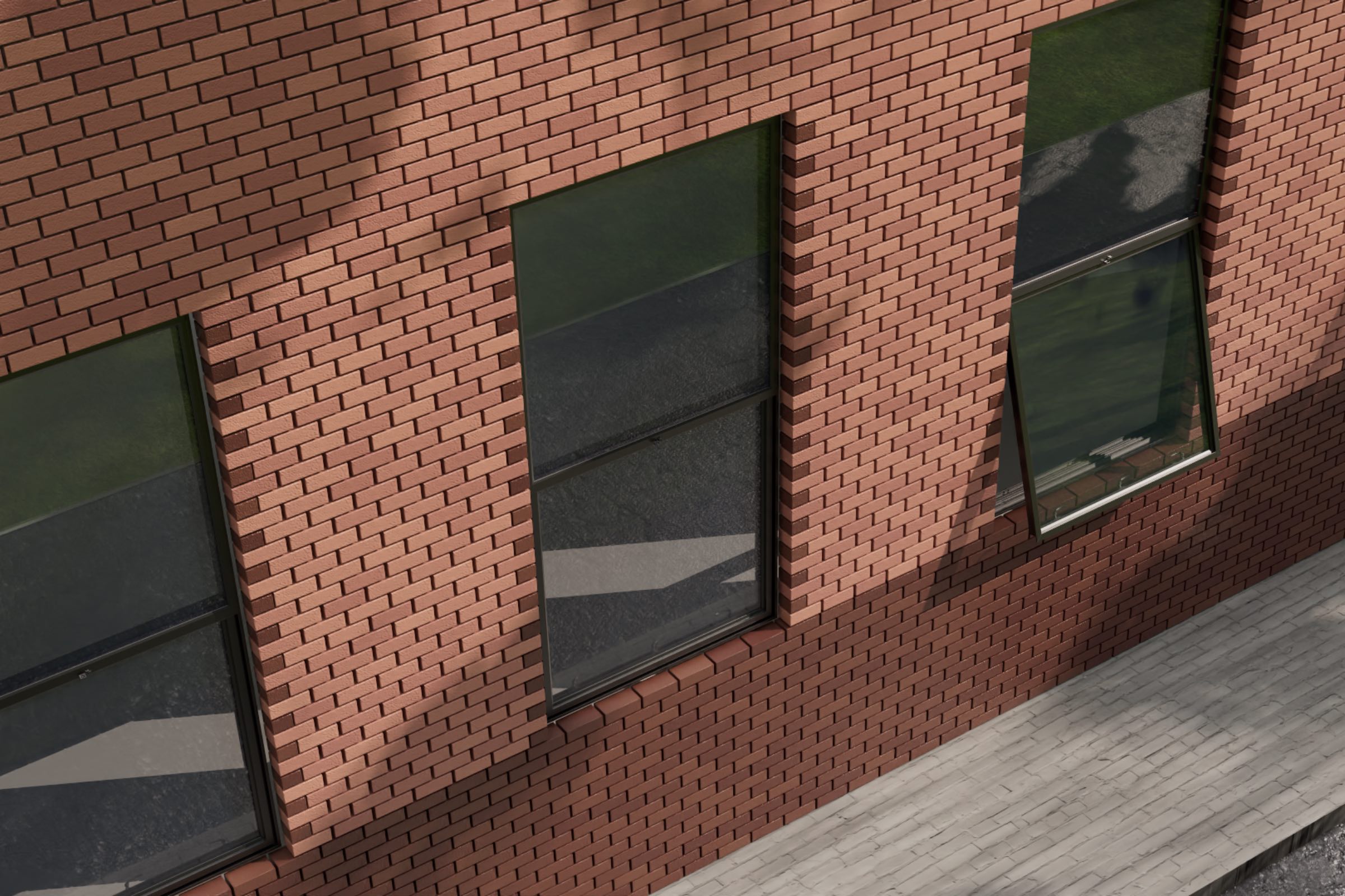 Three large vertical windows in a brick building; two are closed, and one is partially open. Shadows and outdoor scenery are reflected in the glass. A stone walkway runs alongside the building.