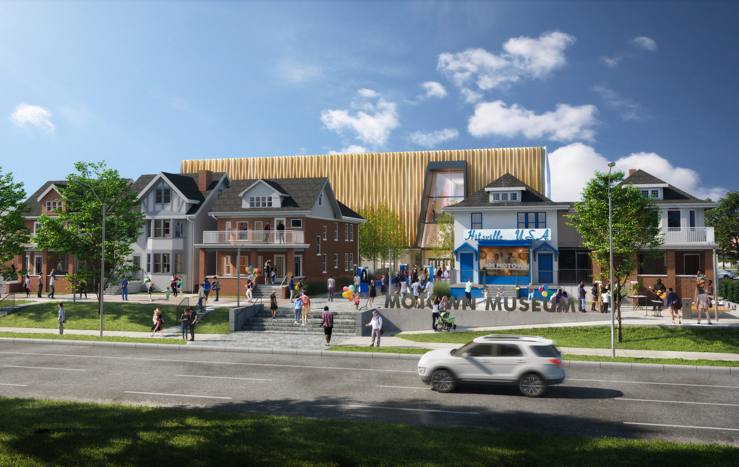 Street view of a museum with a gold modern building behind historic houses, people walking, trees along the street, and a white car driving by in the foreground.