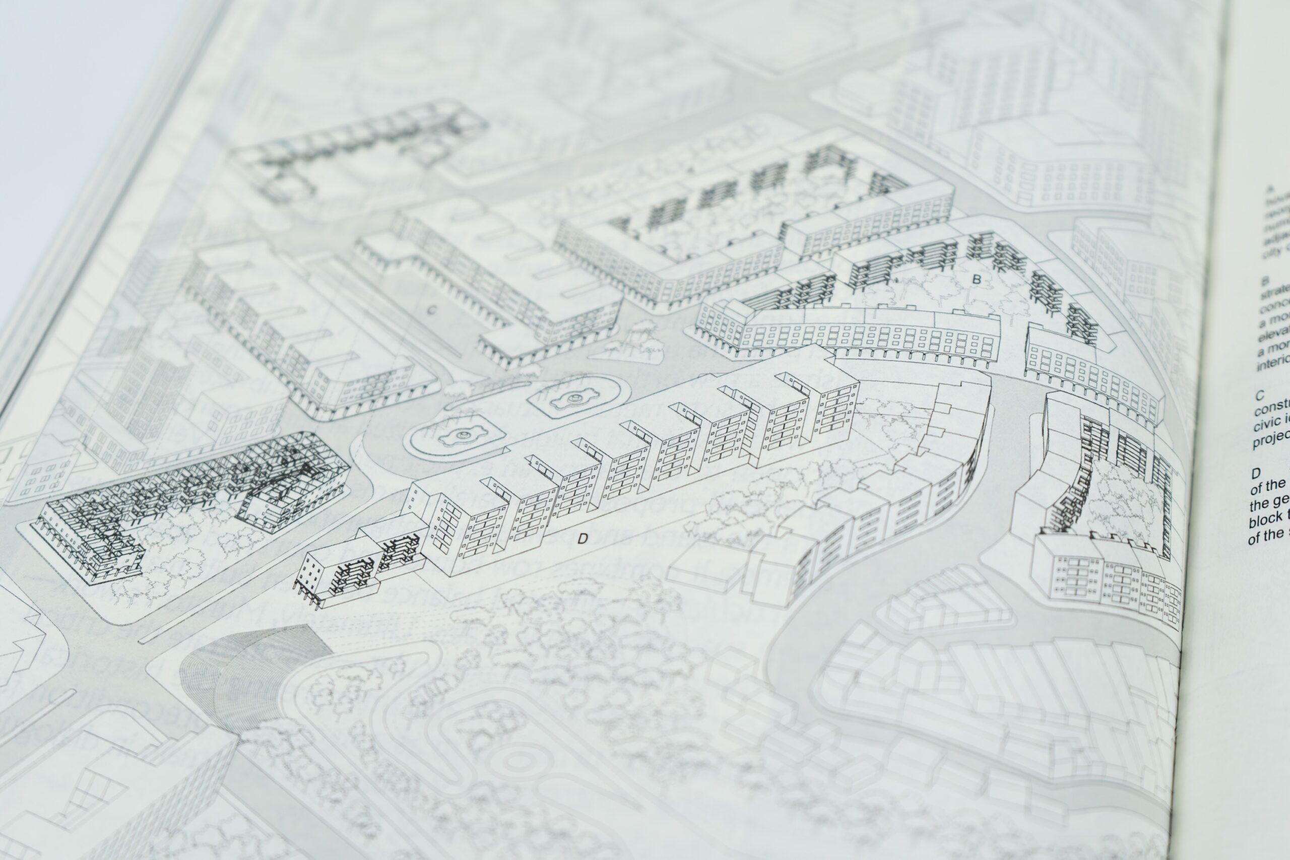 Black and white architectural drawing of a building complex, highlighting labeled sections, streets, and landscape details that reveal Architecture’s Kinships.